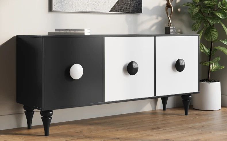 Biała czarna komoda z drewnianymi nóżkami